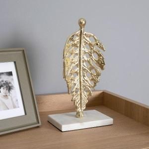 Escultura Metal Dourado, detalhe